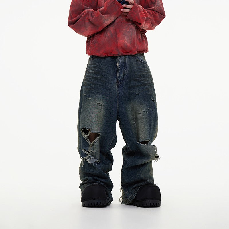 ASTT 24S/S erosion mud dyed old knife cut tear irregular damage mopping Paris denim trousers trend